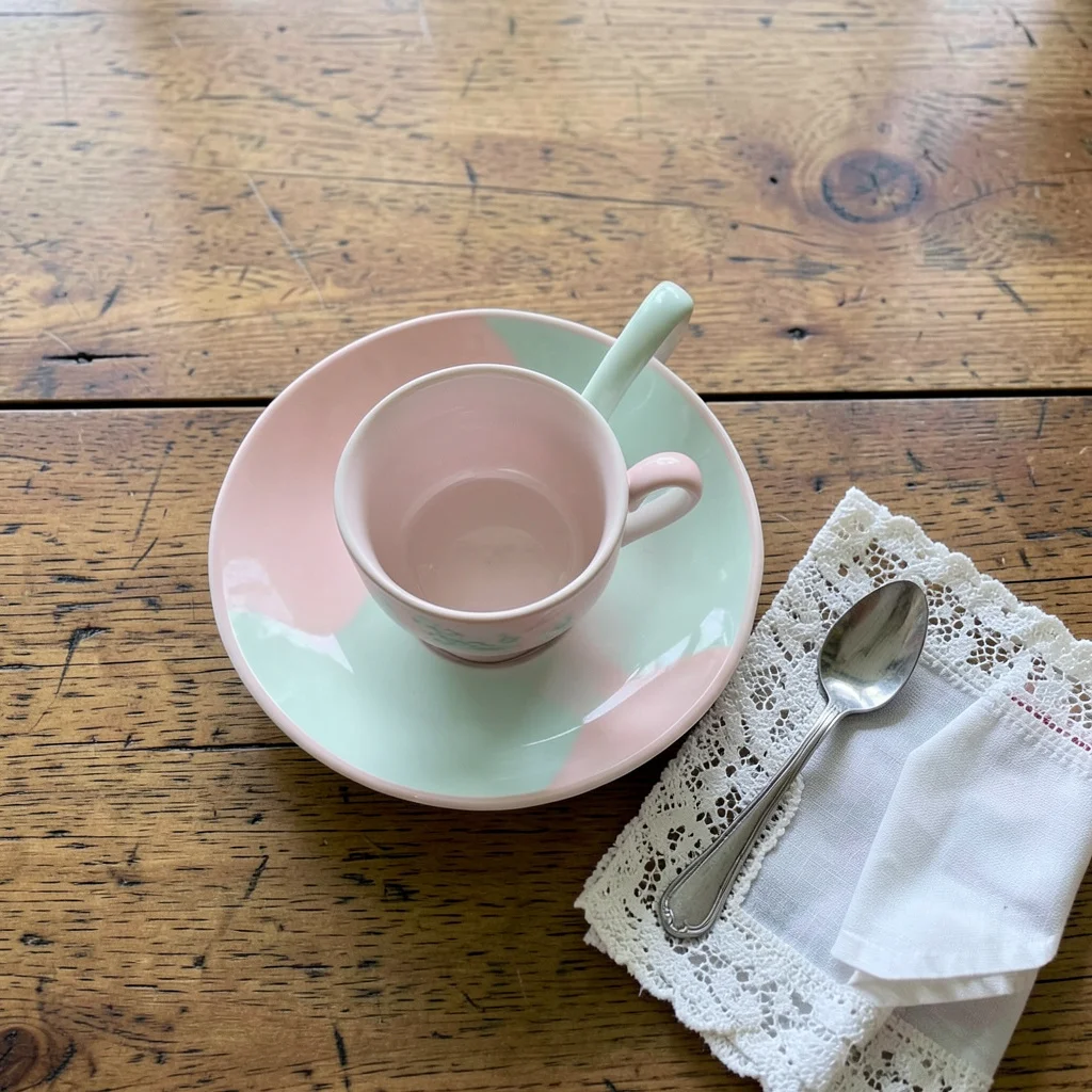A dining table set for a simple, homey tea party baby shower.